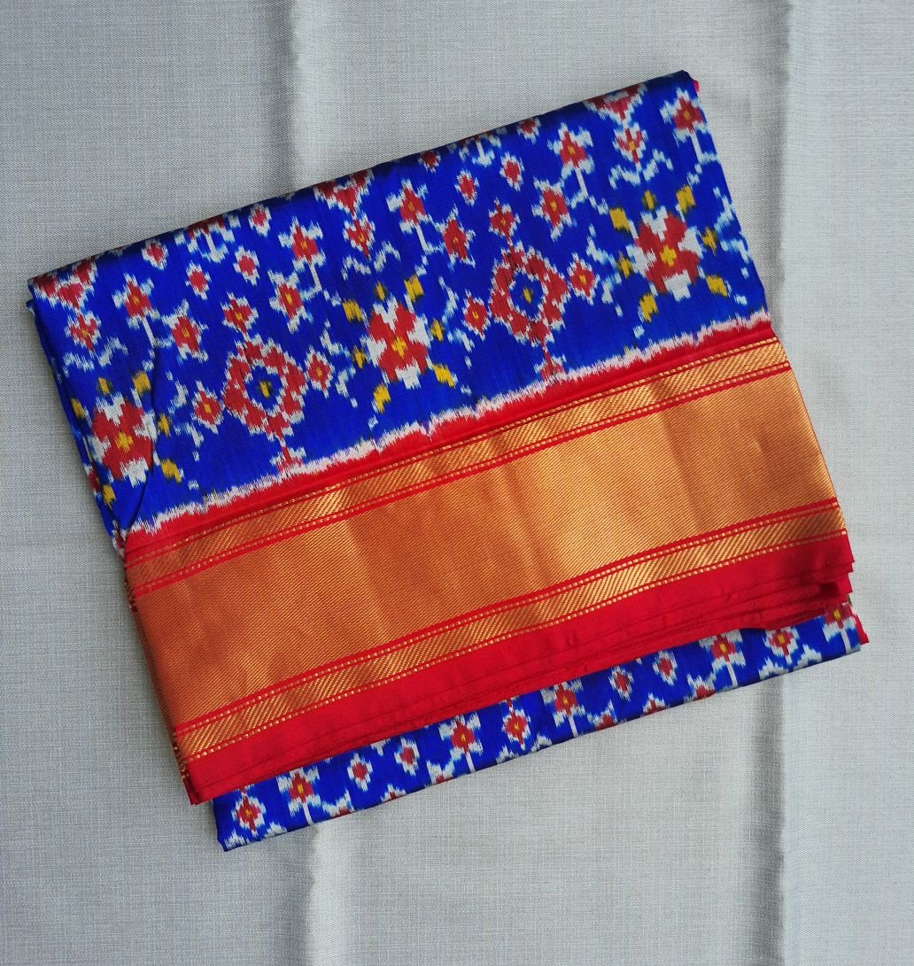 Blue Pochampally silk saree with red tissue border