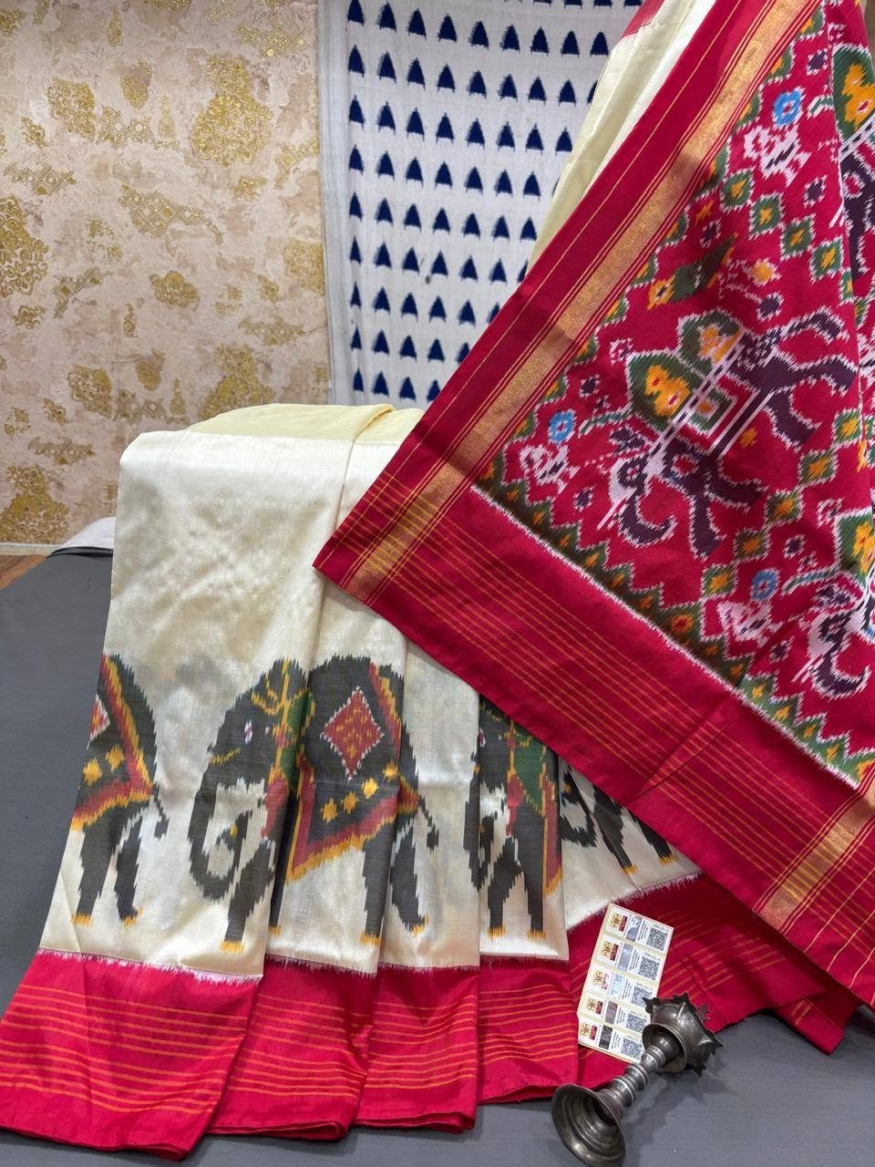ikat silk saree with red border and elephant design