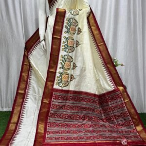 mulberry silk saree with plain white body, elephant design and kaddi border
