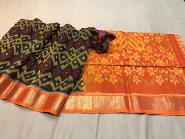 BLack body with Orange pallu ikkat Sico