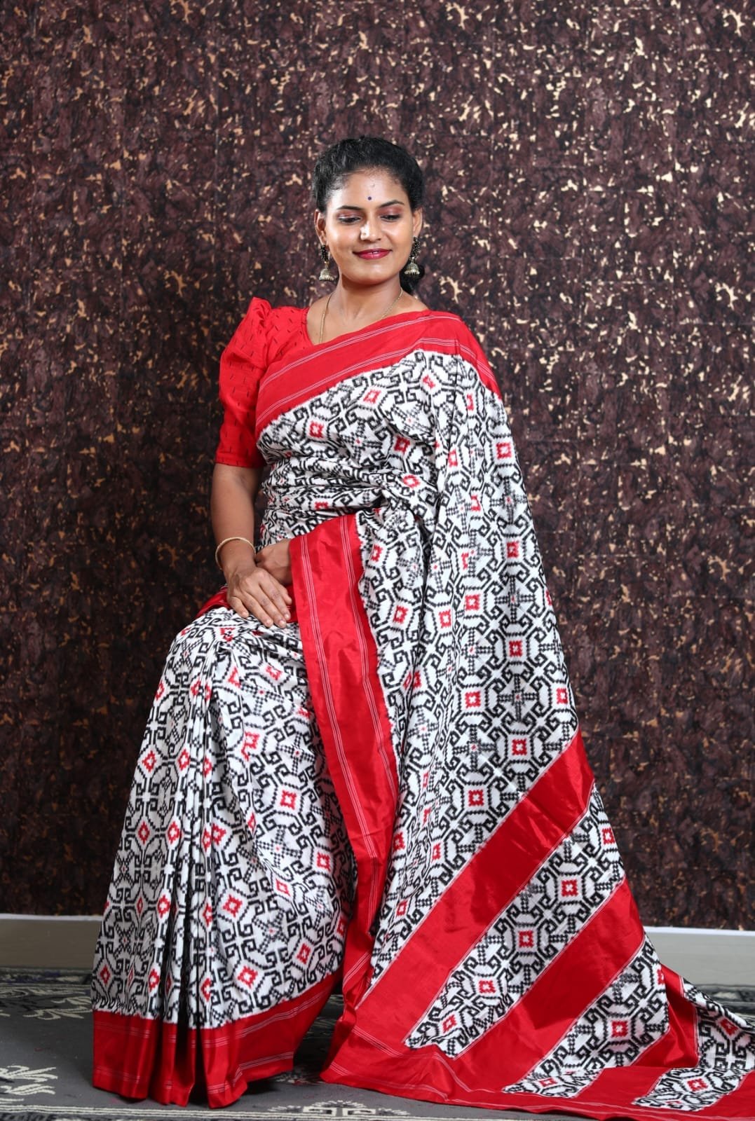 Black red telia rumal silk saree with plain red border