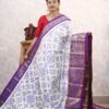 Pochampally Twill ikkat silk saree with white & purple kanchi border, ikat Navratan Patola design