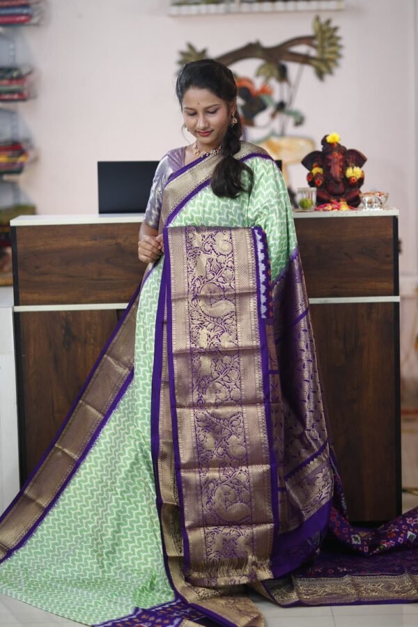 Pochampally Twill ikkat silk saree with green & purple kanchi border