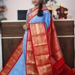 Blue Twill ikat saree with red kanchi border