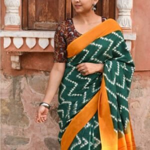 Double ikat cotton saree in green color