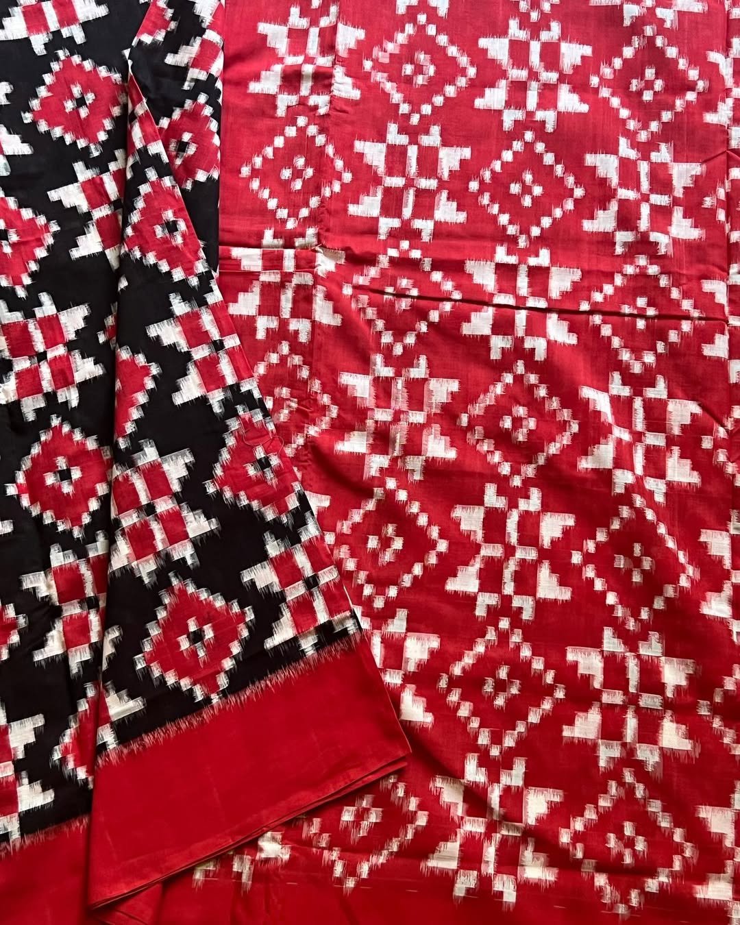 black telia rumal saree with red motifs, red border and red pallu