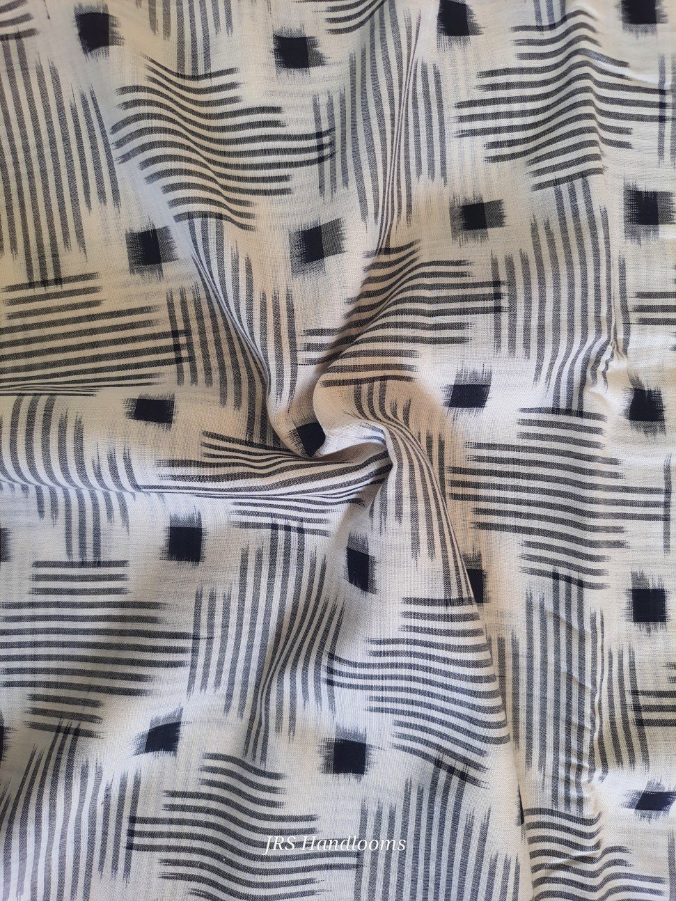 soft double ikkat pattern body closeup