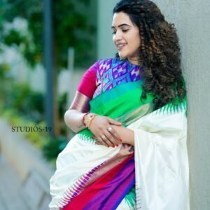 Multi colour green pink and violet colours border with ikkat temple design