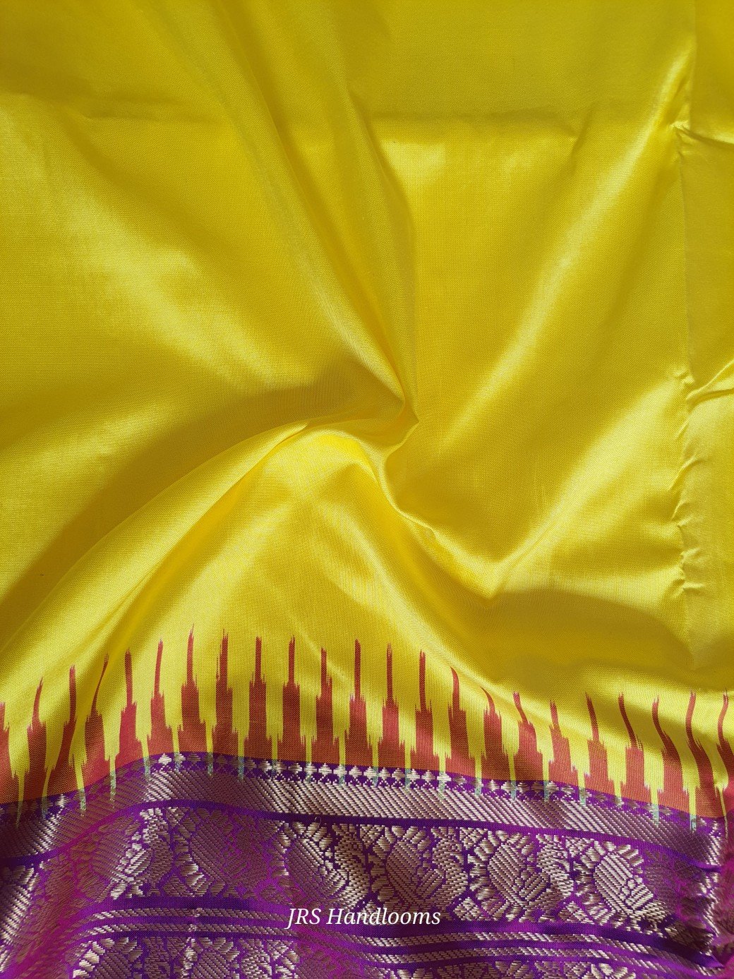 pure yellow pattu silk saree closeup